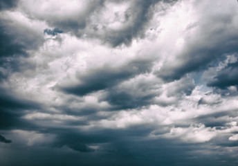 Blue sky with white and black clouds
