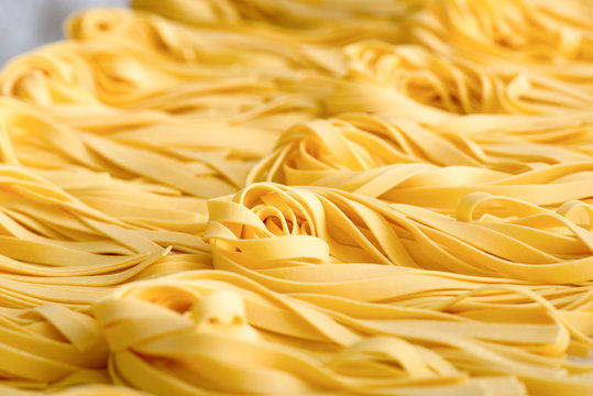 Background Texture Of Fresh Fettuccine Pasta