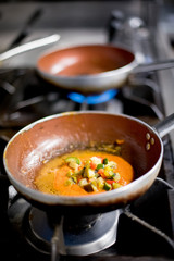 Savory sauce for Italian pasta on a burner