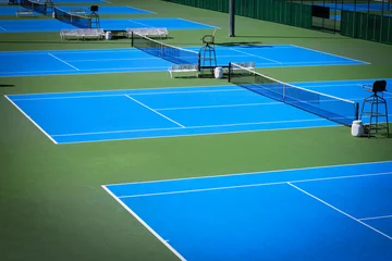 Foto op Canvas blue tennis court © sutichak