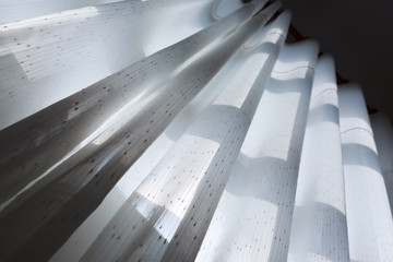 Obraz premium white drapery curtain hanging on the window