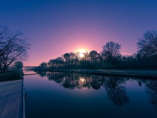 Countryside landscape, sunset over the river