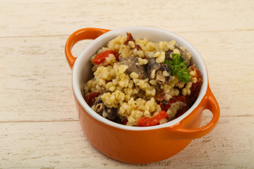 Bulgur with chicken hearts