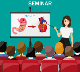 Businesswoman making presentation explaining charts. Healthy lifestyle concept. Doctor show heathy stomach and heart. Human internal organs.