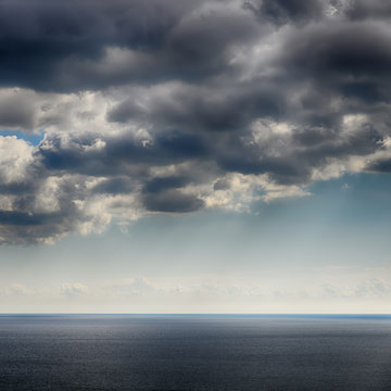 Thunderclouds over the sea. HDR image