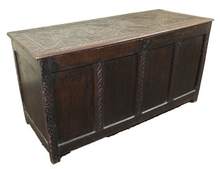 antique dark wood trunk with hand carved details