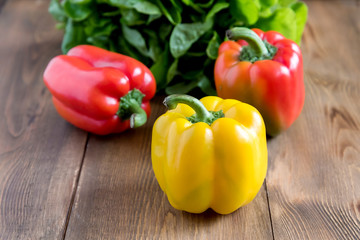 Raw beautiful yellow and red peppers on wooden background Salad Close up Vegetable Healthy and diet food