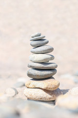Fototapeta na wymiar Balance stone. Zen rocks on the beach. Feng Shui balance