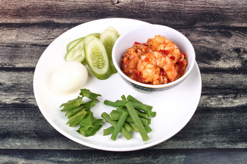 Fresh shrimp chili dip served with side dish.