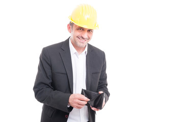 Foreman wearing yellow hardhat checking his wallet