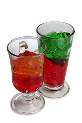 Fototapeta na wymiar Fruit cocktail in a glass goblet on a white background