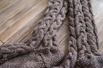 Fototapeta na wymiar Beautiful gray knitted socks. Knitted warm handmade socks