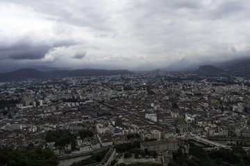 Naklejka premium Cloudy over City