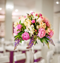 Beautiful flowers. Decor on the table. The concept of a party and wedding decor.