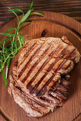 Succulent portions of grilled fillet mignon served with rosemary