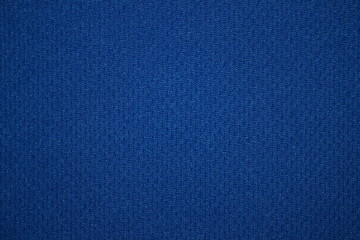 текстура яркой, насыщенной синей ткани крупным планом...