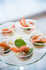 Selective focus on Spicy Prawn or Shrimp steamed with lemon salads and mint on top, Thai Food