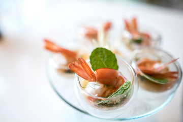 Selective focus on Spicy Prawn or Shrimp steamed with lemon salads and mint on top, Thai Food