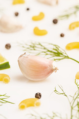 Obraz na płótnie Canvas Garlic clove with different spices around