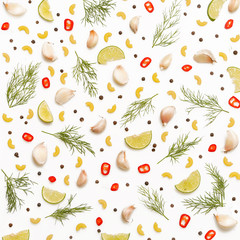 Garlic cloves, black peppercorn, chili, lime slices and dill