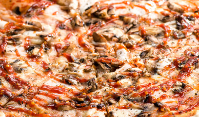 Pizza with mushrooms, ham and cheese