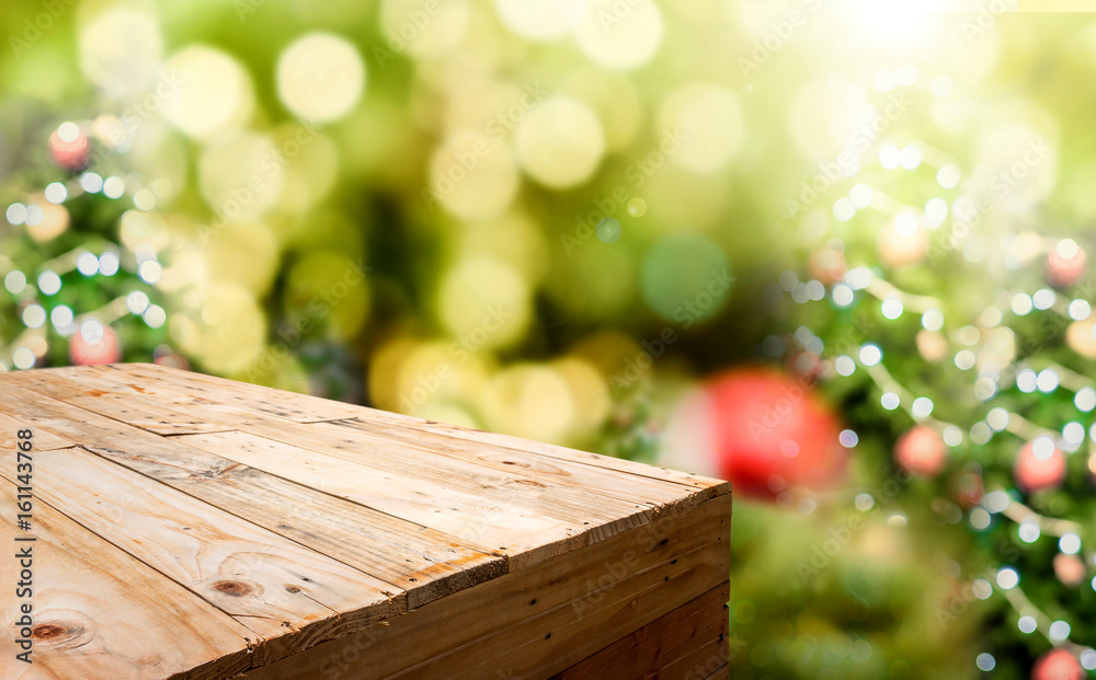 Poster empty wood plank food stand with blur christmas tree bokeh light background,template mock up for dis