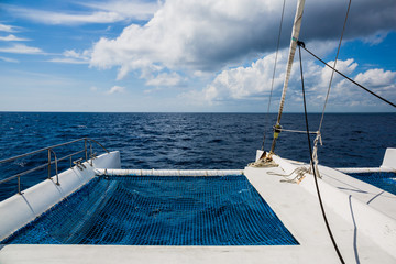 Sailing yacht catamaran sailing in the sea.