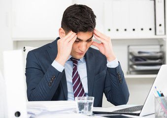 Young office manager is having complicated issue in project
