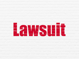 Law concept: Lawsuit on wall background