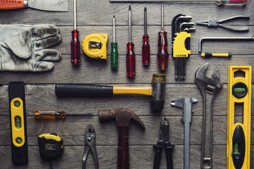 Old tools on a wooden table
