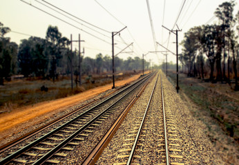 Fototapeta na wymiar distant train tracks railway background