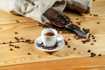 Coffee beans and coffee cup