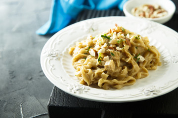 Noddles with peanut butter sauce and chicken
