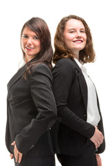 Two young business women in full li
