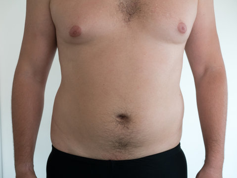 man with big belly on white background