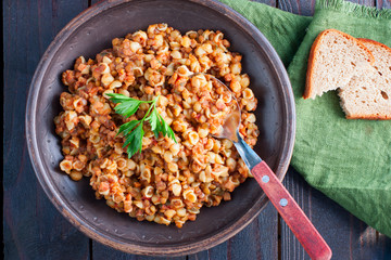 Pasta with lentils and ham, horizontal