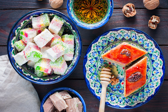 Turkish sweets - baklava, rahat-lukum, halva, top view