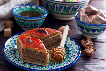 Homemade baklava with nuts and honey syrup