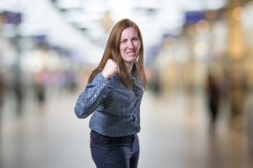 Fototapeta premium Pretty young businesswoman is angry
