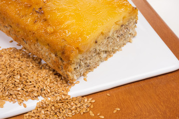 Cut wholemeal pineapple cake with linseed and golden linseed 