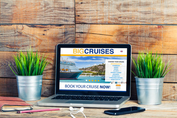 Cruise travel booking website in a laptop at the office.