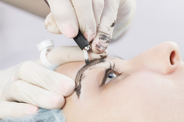 Microblading eyebrows workflow in a beauty salon 