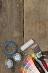 Naklejka premium Painting Tools, Supplies, and Swatches on Wood with Copy Space