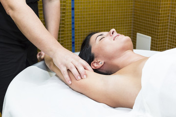 Fototapeta na wymiar Woman in a beauty salon doing massage 