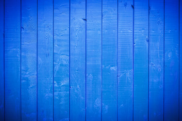 Fototapeta na wymiar Blue painted planks. Texture of wood.