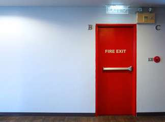 Fire exit emergency door red color and LED light made by metal material for protect life when in...