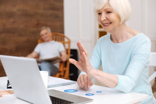 Incredible nice aged woman talking to her friend online