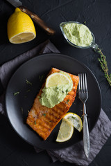 Grilled salmon with avocado sauce