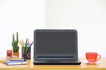 Fototapeta premium Tablet and cup of coffee in Modern office.copy space.