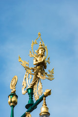 the Thai art angle brass on the top of pole light
